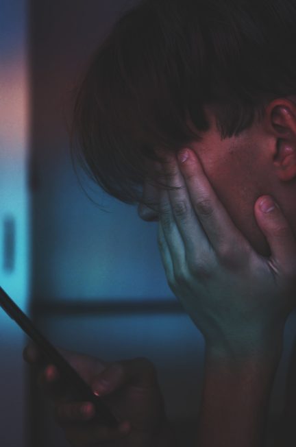 man holding smartphone in close up