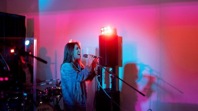 woman singing in karaoke