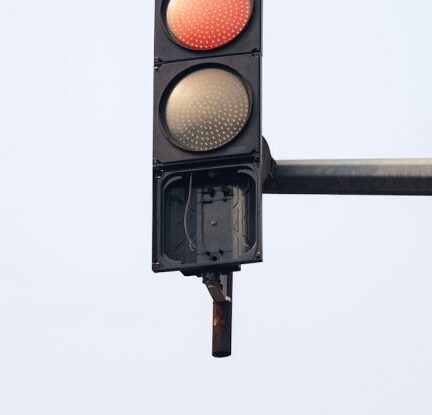 Traffic Management - Close-up of a Traffic Light Showing Red Light