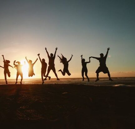 Eco-Friendly Travel - Silhouette Photography of Group of People Jumping during Golden Time