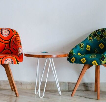 Furniture - Two Assorted-color Padded Chairs Near Side Table