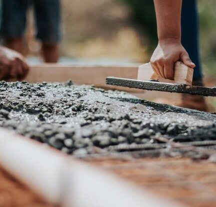 Volunteering - Selective Focus Photography Cement