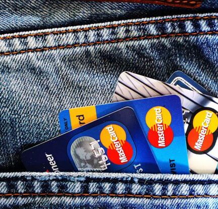 Credit Score - Blue Master Card on Denim Pocket